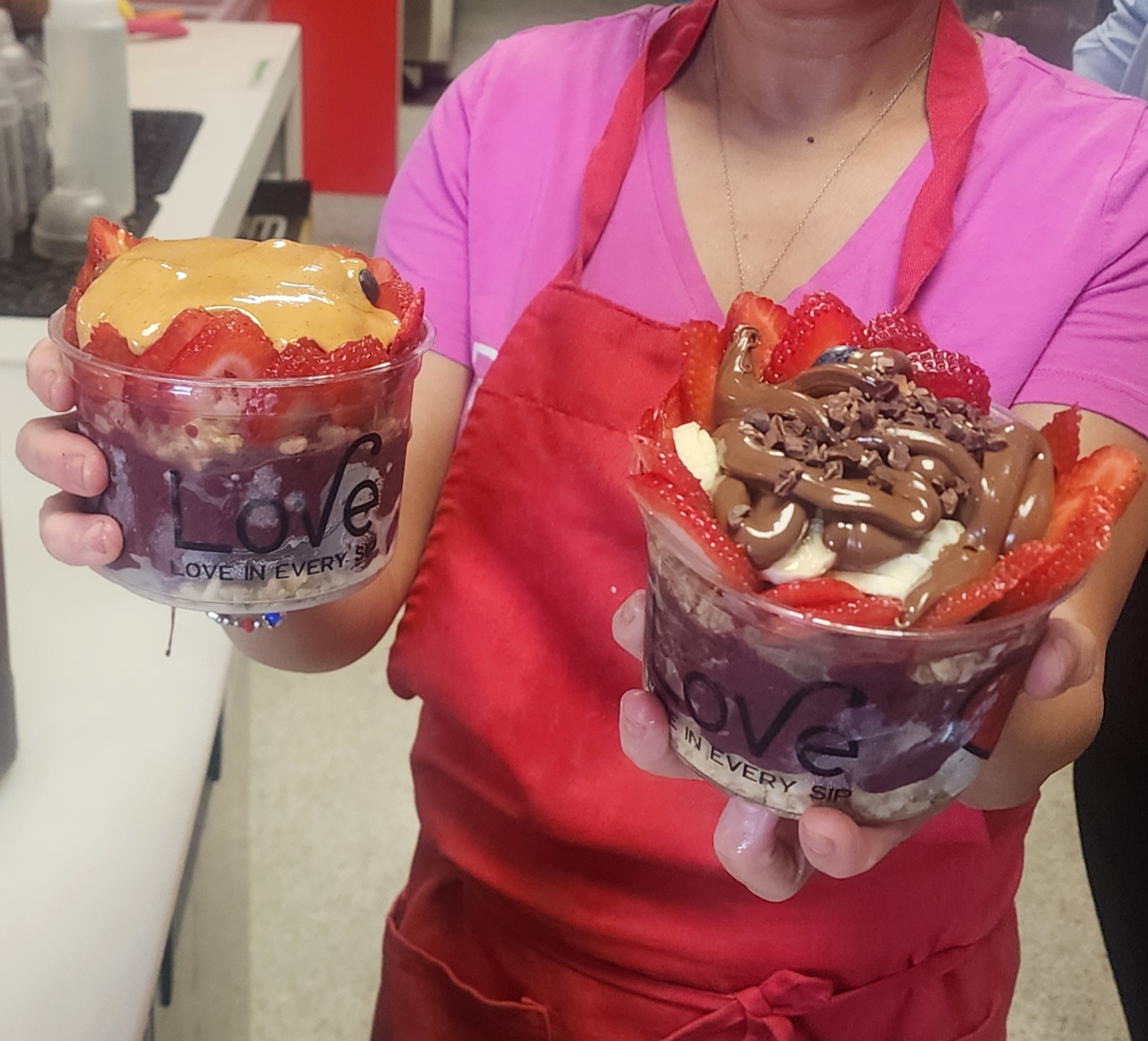 Acai bowls with peanut butter, strawberries, banana and chocolate