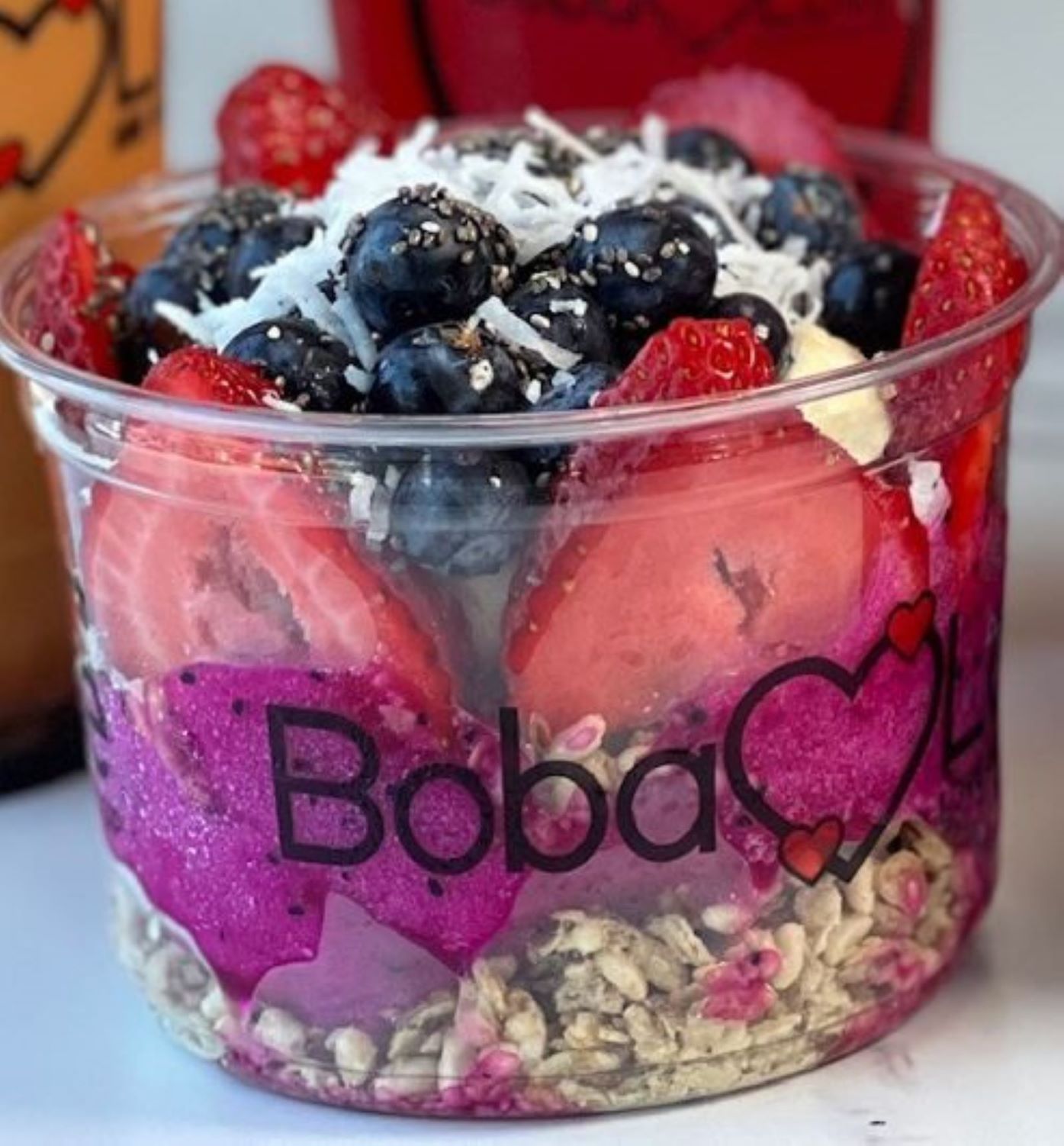 Pitaya bowl with strawberries, blueberries, coconut and granola